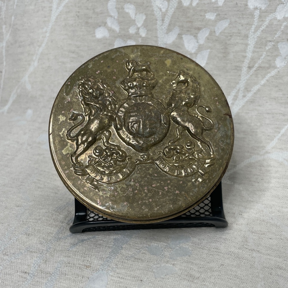 Vintage British coat of arms brass color tin container